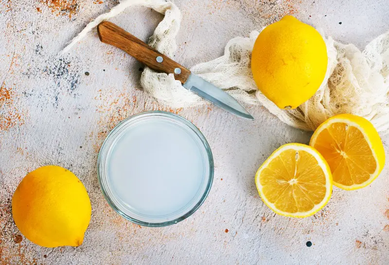Lemons on  a table with a knife