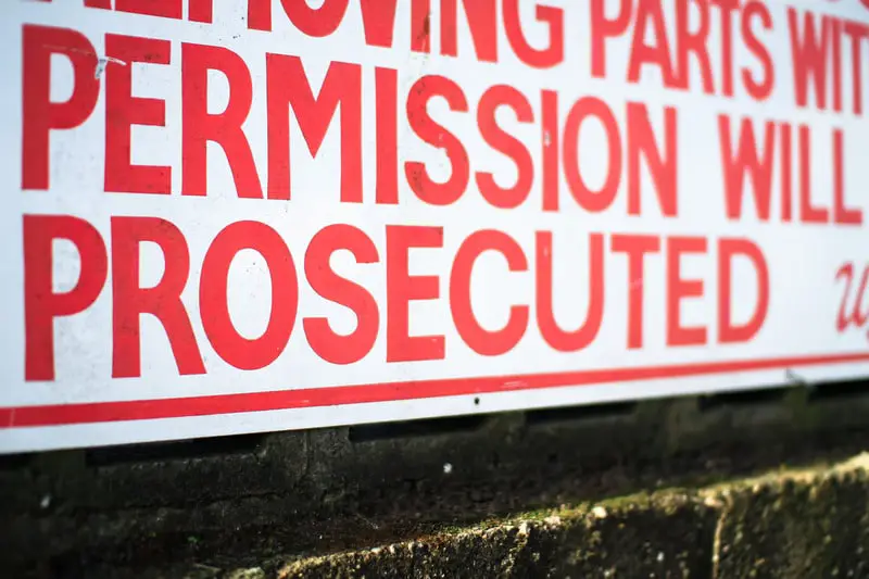 Section of a warning sign at the abandoned Furber's Scrapyard in Shropshire, England.