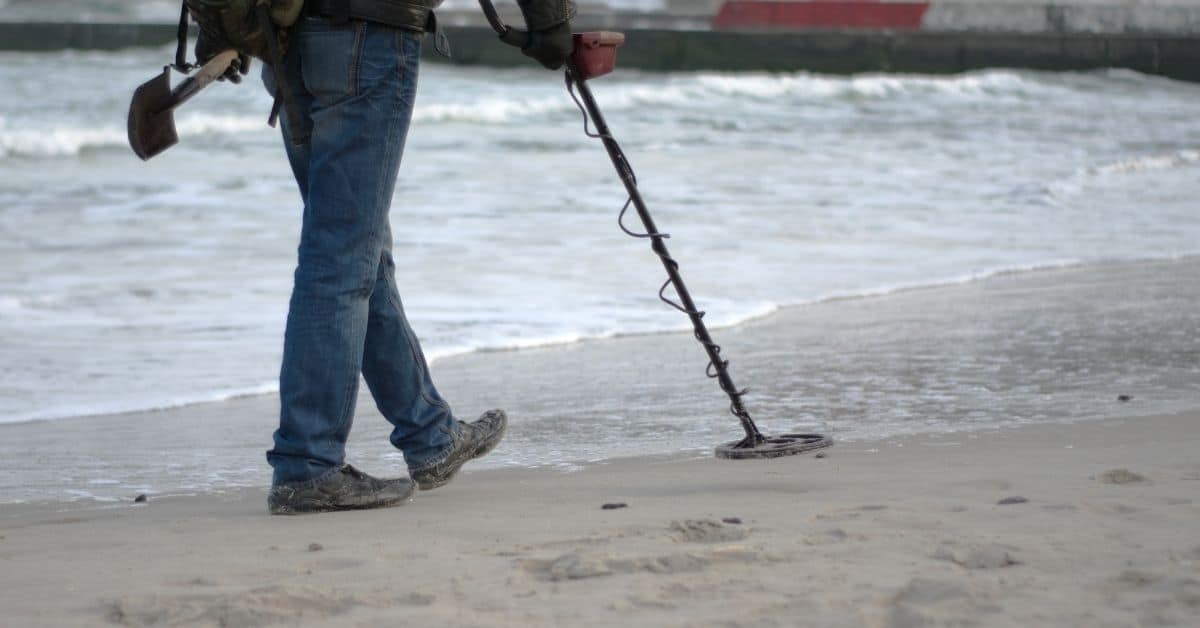 Metal detecting on the beach