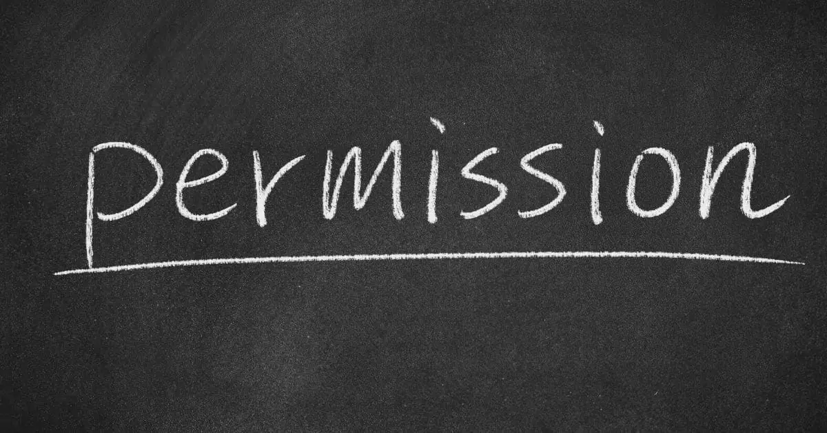 permission written on a chalk board